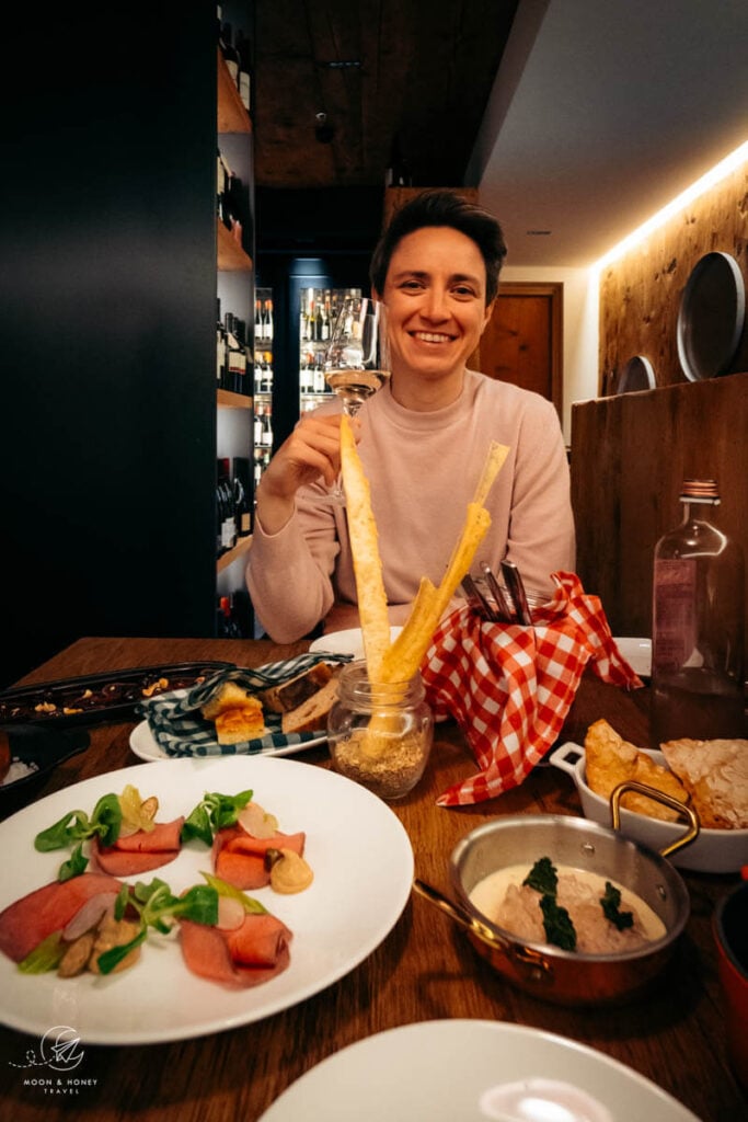 Katrin Walzl eating dinner at Hotel de Len, Cortina d'Ampezzo Town Center, Dolomites